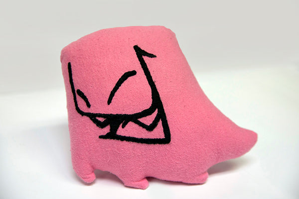 Hand sewn small Mr. Fangs pink plush with hand-embroidered smile in black. 