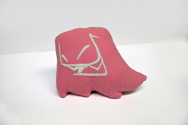 Hand sewn small pink Mr. Fangs plush with hand-embroidered smile in white.