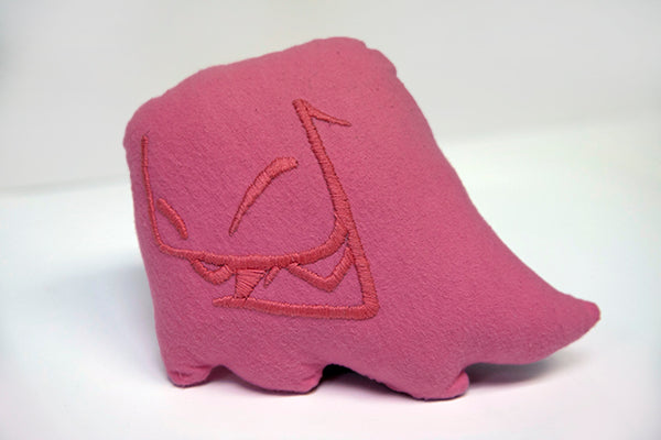 Hand sewn small pink Mr. Fangs plush with hand-embroidered smile in pink.