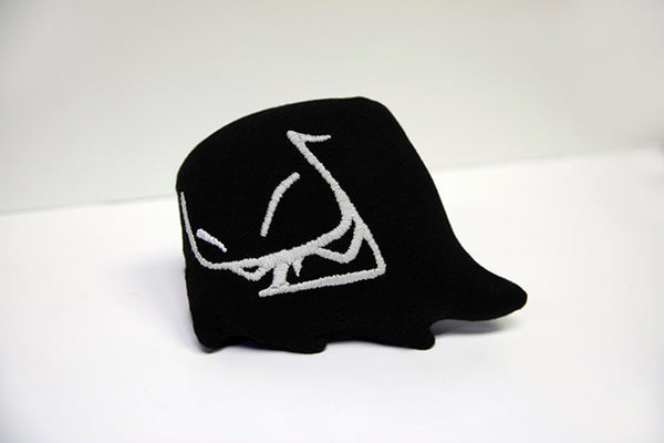 Hand sewn small black Mr. Fangs plush with hand-embroidered smile in white.