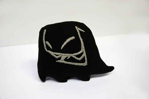 Hand sewn small Mr. Fangs black plush with hand-embroidered smile in grey. 